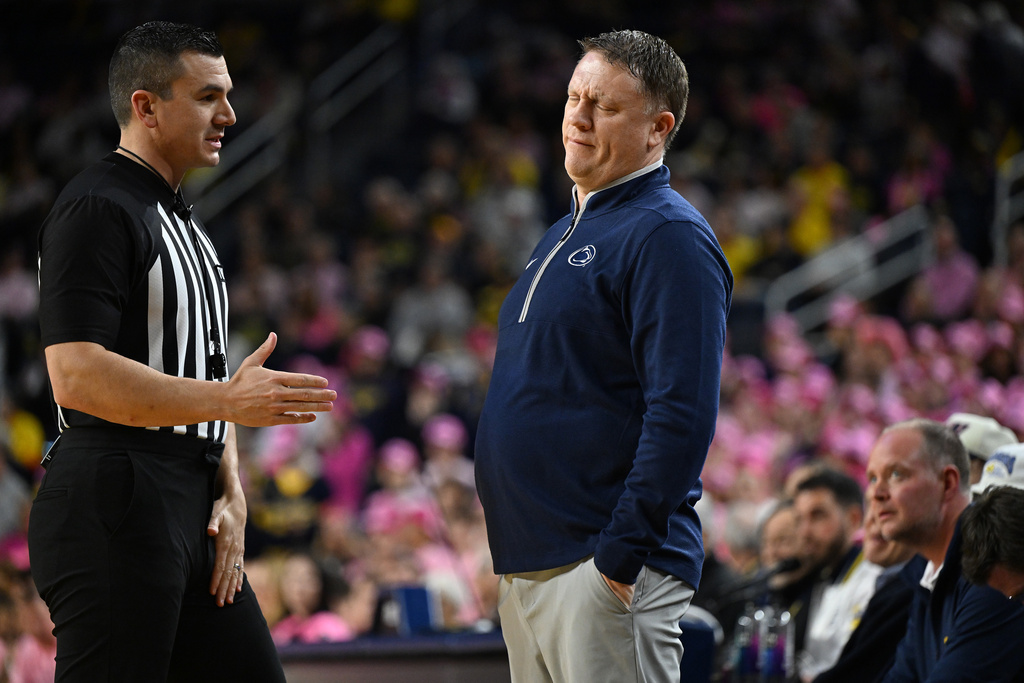 Penn State head coach Mike Rhoades reacts to the referee's explanation for a foul call on one of his players against Michigan in the first half of an NCAA college basketball game in Ann Arbor, Mich., Thursday, Feb. 5, 2026. (AP Photo/Lon Horwedel)