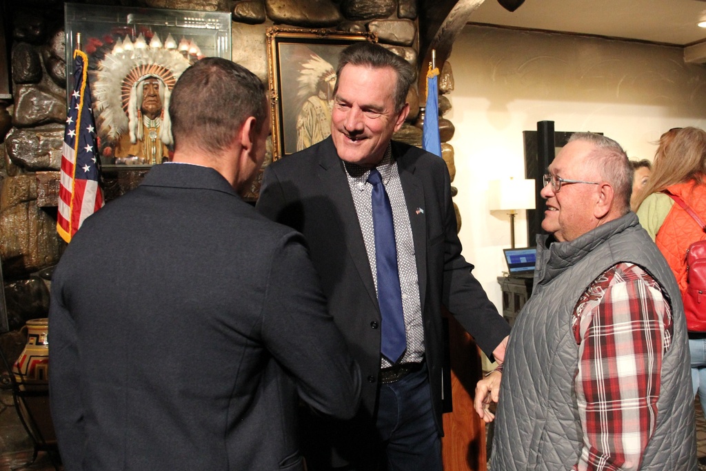 Gov. Larry Rhoden speaks with attendees of his announcement event at the Hotel Alex Johnson, Tuesday, Nov. 18, 2025, in Rapid City, S.D. (Shalom Baer Gee/Rapid City Journal via AP)