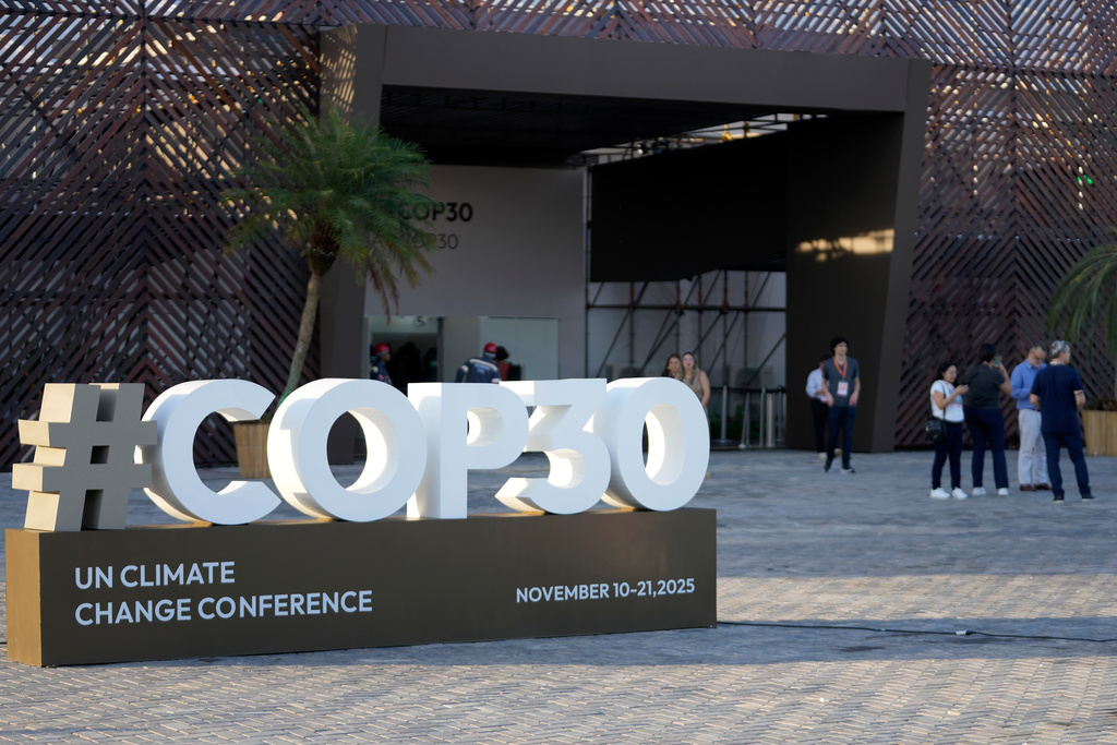 A sign for the upcoming COP30 U.N. Climate Summit sits outside of the press center in Belem, Para state, Brazil, Tuesday, Nov. 4, 2025. (AP Photo/Eraldo Peres)