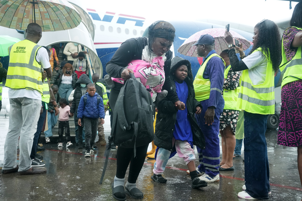 Nigerian nationals repatriated from South Africa, following concerns about unrest, arrive at the Murtala Muhammed International Airport in Lagos, Nigeria, Tuesday, June 30, 2026. (AP Photo/Sunday Alamba)