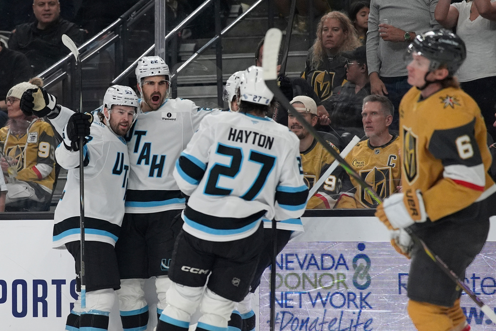 Utah Mammoth center Jack McBain (22) celebrates after scoring against the Vegas Golden Knights during the first period of an NHL hockey game Thursday, March 19, 2026, in Las Vegas. (AP Photo/John Locher)