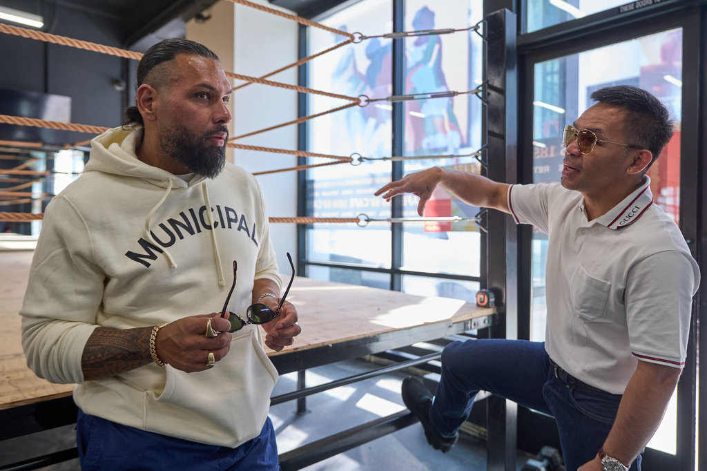 Jas Mathur, CEO of Manny Pacquiao Promotions, left, and boxer Manny Pacquiao tour the new "Pacquiao Prime Boxing" gym, a boxing facility formerly owned by rival Floyd Mayweather Jr., in the Hollywood area of Los Angeles on Monday, April 6, 2026. (AP Photo/Damian Dovarganes)