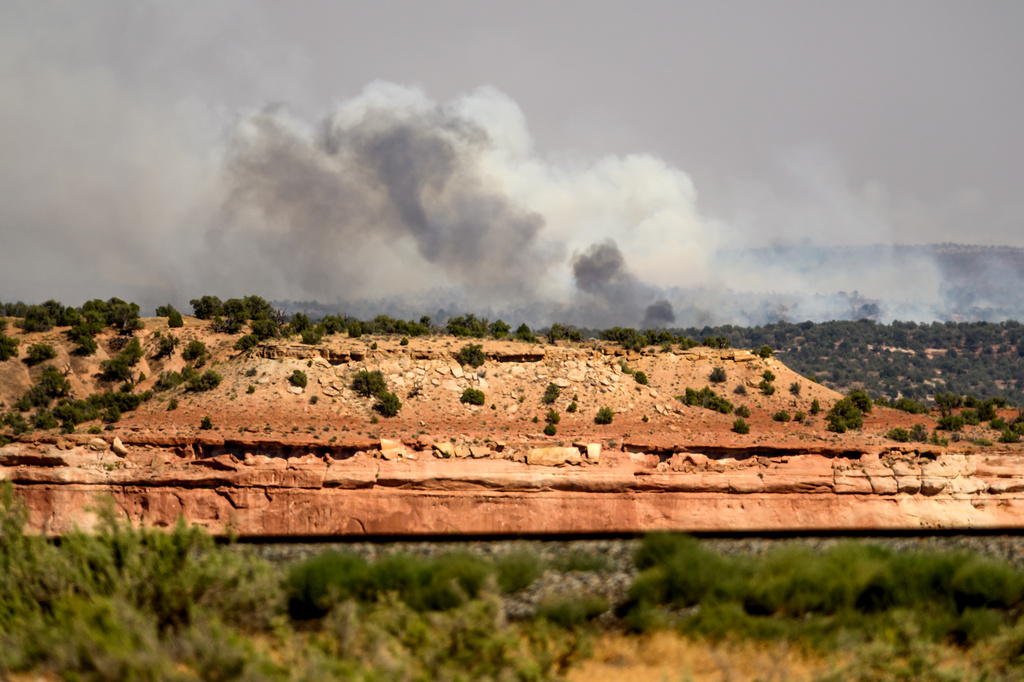 The Snyder Fire burns near Thompson Springs, Utah, on Sunday, June 28, 2026. (AP Photo/Noah Berger)