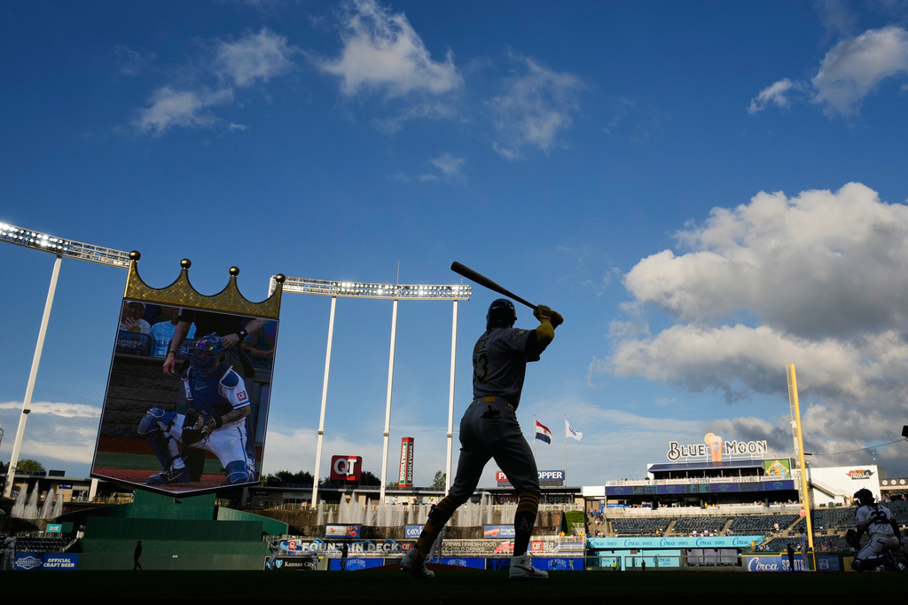 Athletics' Henry Bolte warms up before a baseball game against the Kansas City Royals, Wednesday, Aug. 19, 2026, in Kansas City, Mo. (AP Photo/Charlie Riedel)