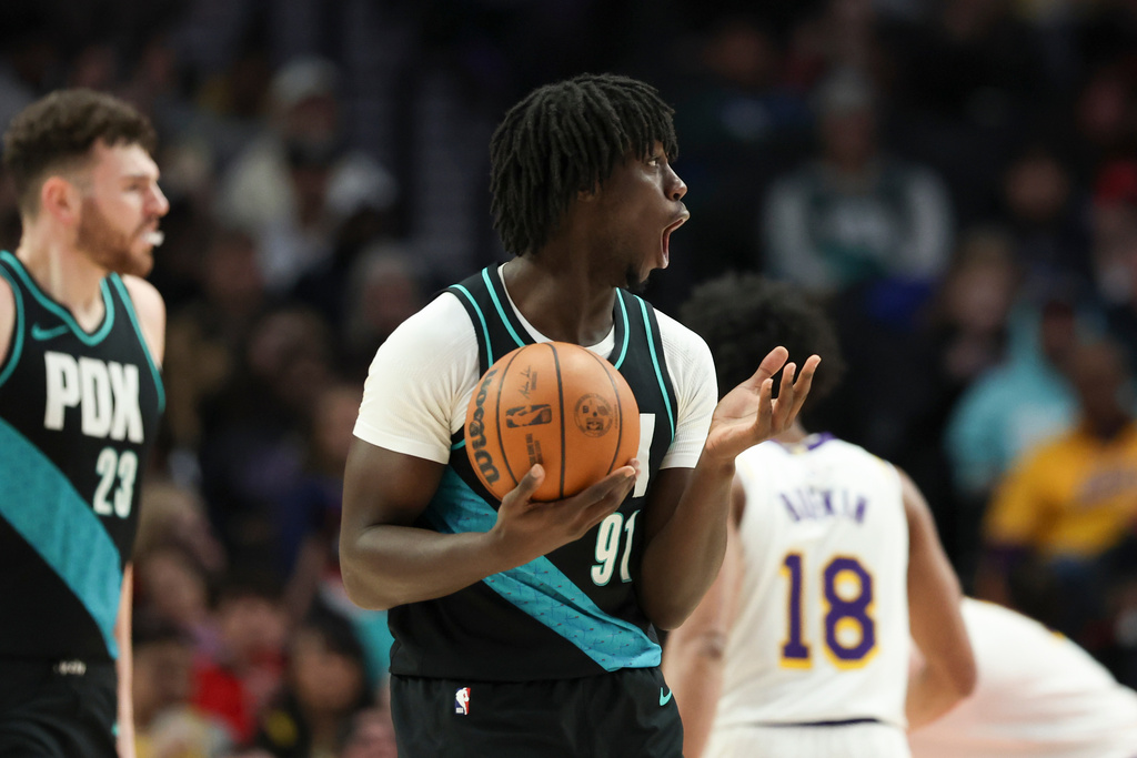 Portland Trail Blazers guard Sidy Cissoko (91) reacts after a call during the first half of an NBA basketball game against the Los Angeles Lakers Saturday, Jan. 17, 2026, in Portland, Ore. (AP Photo/Amanda Loman)