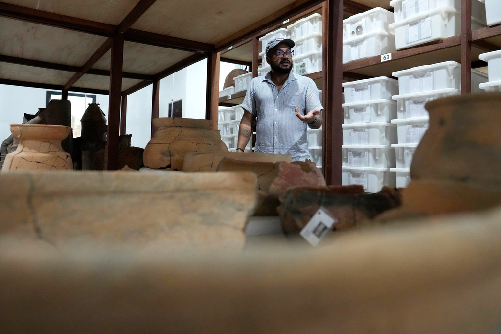 Archaeologist Lucio Flavio Costa Leite speaks about the collection of cataloged archaeological artifacts at the Institute for Scientific and Technological Research in Macapa, Amapa state, Brazil, Sunday, March 8, 2026. (AP Photo/Eraldo Peres)