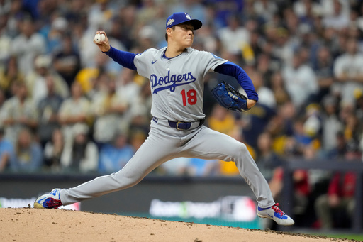 Los Angeles Dodgers pitcher Yoshinobu Yamamoto throws against the Milwaukee Brewers during the fifth inning in Game 2 of baseball's National League Championship Series, Tuesday, Oct. 14, 2025, in Milwaukee. (AP Photo/Ashley Landis) Los Angeles Dodgers pitcher Yoshinobu Yamamoto throws against the Milwaukee Brewers during the fifth inning in Game 2 of baseball's National League Championship Series, Tuesday, Oct. 14, 2025, in Milwaukee. (AP Photo/Ashley Landis)