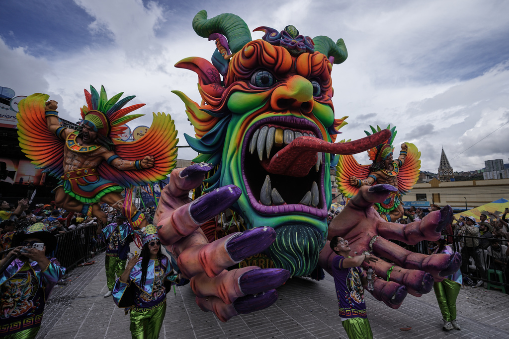 Revelers partake in the Black and White Carnival, recognized by UNESCO as Intangible Cultural Heritage, in Pasto, Colombia, Tuesday, Jan. 6, 2026. (AP Photo/Ivan Valencia)