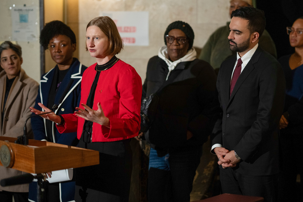 Cea Weaver, left, speaks during a news conference with New York Mayor Zohran Mamdani, far right,, Thursday, Jan. 1, 2026, in New York. (Michael Appleton/Mayoral Photography Office via AP)