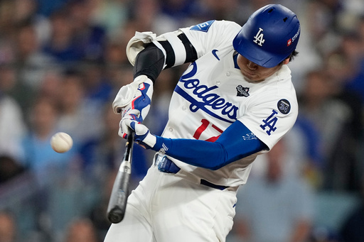 Los Angeles Dodgers' Shohei Ohtani hits a RBI-double against the Toronto Blue Jays during the fifth inning in Game 3 of baseball's World Series, Monday, Oct. 27, 2025, in Los Angeles.(AP Photo/Brynn Anderson) Los Angeles Dodgers' Shohei Ohtani hits a RBI-double against the Toronto Blue Jays during the fifth inning in Game 3 of baseball's World Series, Monday, Oct. 27, 2025, in Los Angeles.(AP Photo/Brynn Anderson)