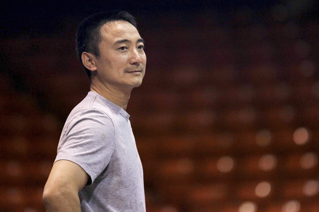FILE - Gymnastics coach Liang "Chow" Qiao is seen during a practice session for the US Classic gymnastics meet, May 25, 2012, in Chicago. (AP Photo/Charles Rex Arbogast, File)