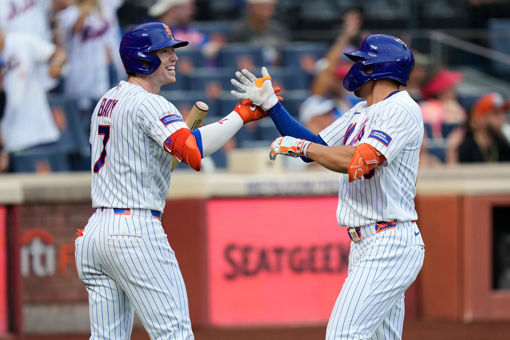 New York Mets' Tyrone Taylor, right, celebrates his solo home run with Brett Baty during the fifth inning of a baseball game against the Kansas City Royals, Thursday, July 9, 2026, in New York. (AP Photo/Seth Wenig)