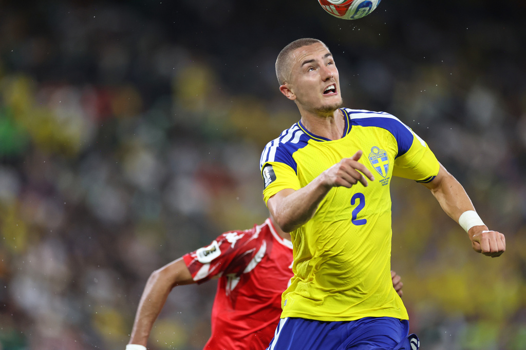 Sweden's Gustaf Lagerbielke (2) heads the ball during the World Cup Group F soccer match between Sweden and Tunisia in Guadalupe, near Monterrey, Mexico, Sunday, June 14, 2026. (AP Photo/Addison Simmons)