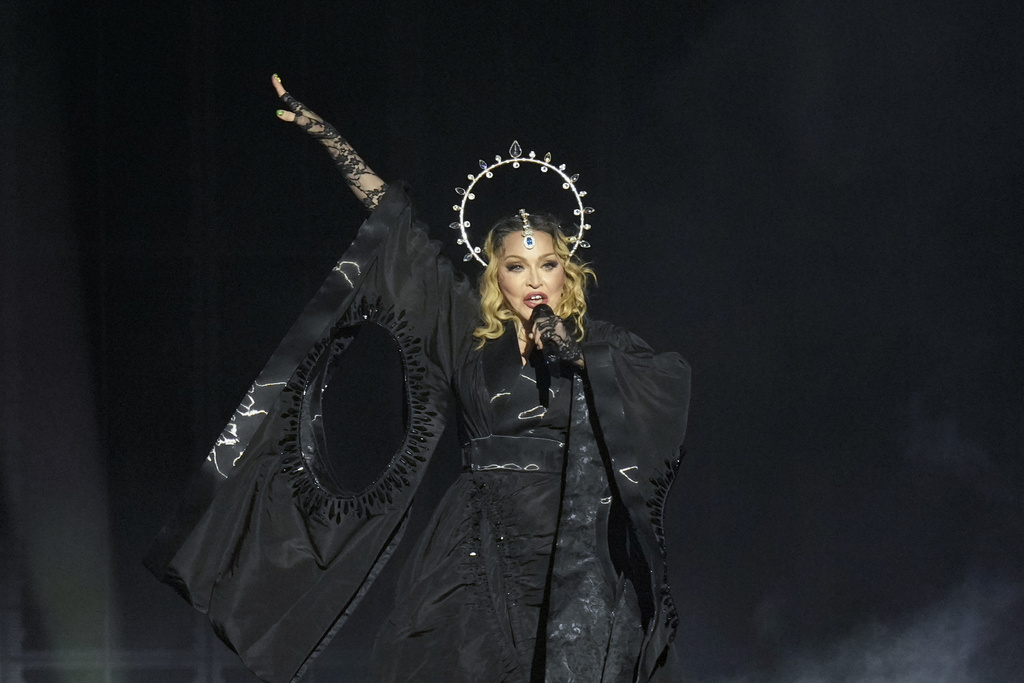 FILE - Madonna performs in the final show of her The Celebration Tour, on Copacabana Beach in Rio de Janeiro, Brazil, Saturday, May 4, 2024. (AP Photo/Silvia Izquierdo, File)