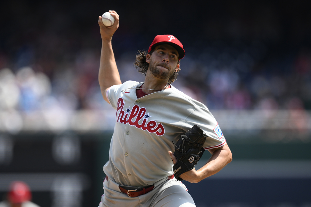 Philadelphia Phillies starting pitcher Aaron Nola throws during the first inning of a baseball game against the Washington Nationals, Sunday, Aug. 17, 2025, in Washington. (AP Photo/Nick Wass)