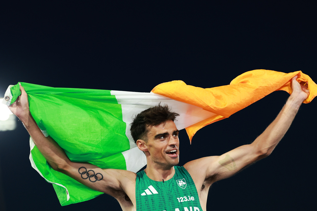 Ireland's Andrew Coscoran celebrates winning the bronze medal in the men's 1,500 meters final at the European Athletics Championships in Birmingham, England, Saturday, Aug. 15, 2026. (AP Photo/Morgan Harlow)