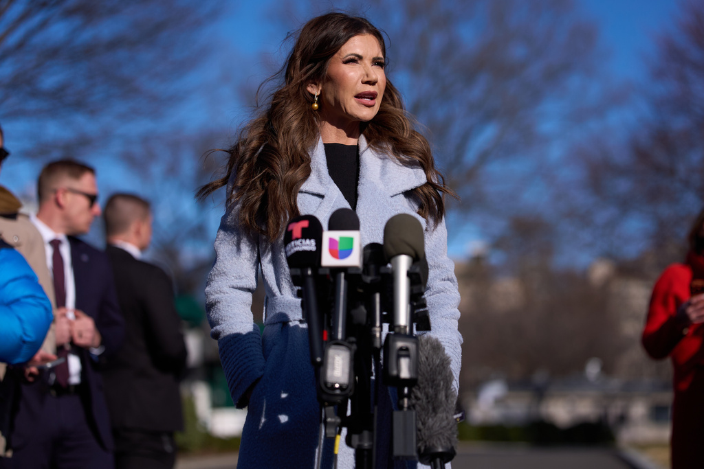 Homeland Security Secretary Kristi Noem speaks with reporters at the White House, Thursday, Jan. 15, 2026, in Washington. (AP Photo/Evan Vucci)