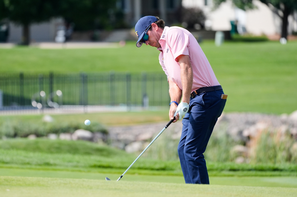 Ben Kohles hits from the 16th hole during the first round of the 3M Open golf tournament at the Tournament Players Club Thursday, July 23, 2026, in Blaine, Minn. (AP Photo/Bruce Kluckhohn)