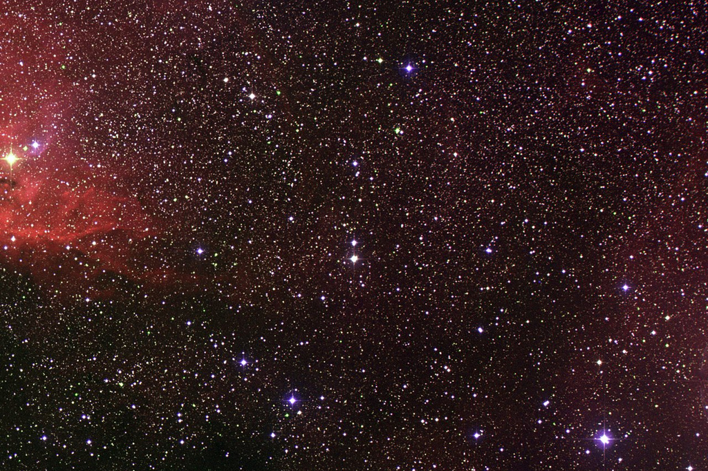 This wide-field, ground-based image provided by NASA on Wednesday, April, 15, 2026, shows the visible light component of Cygnus X-1, center, a rich source of X-rays in the constellation of Cygnus. (NASA, ESA, Digitized Sky Survey 2, Davide De Martin (ESA/Hubble) via AP)