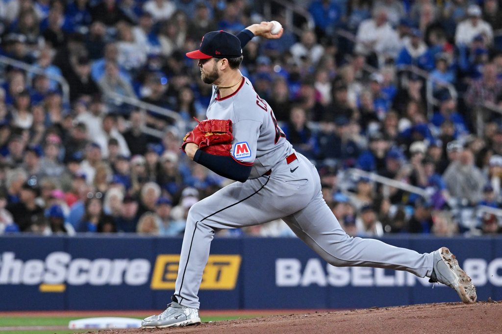 Cleveland Guardians starting pitcher Slade Cecconi (44) throws to a Toronto Blue Jays batter in the first inning of a baseball game, in Toronto, Sunday, April 26, 2026. (Jon Blacker/The Canadian Press via AP)
