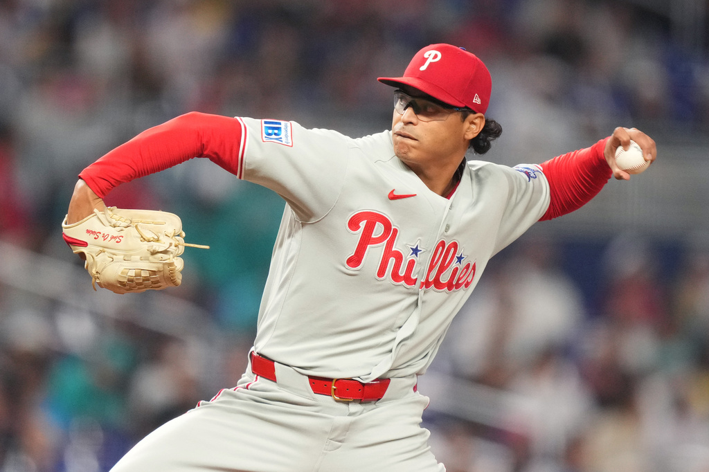Philadelphia Phillies pitcher Jesús Luzardo delivers against the Miami Marlins during the first inning of a baseball game, Sunday, May 3, 2026, in Miami. (AP Photo/Jim Rassol)