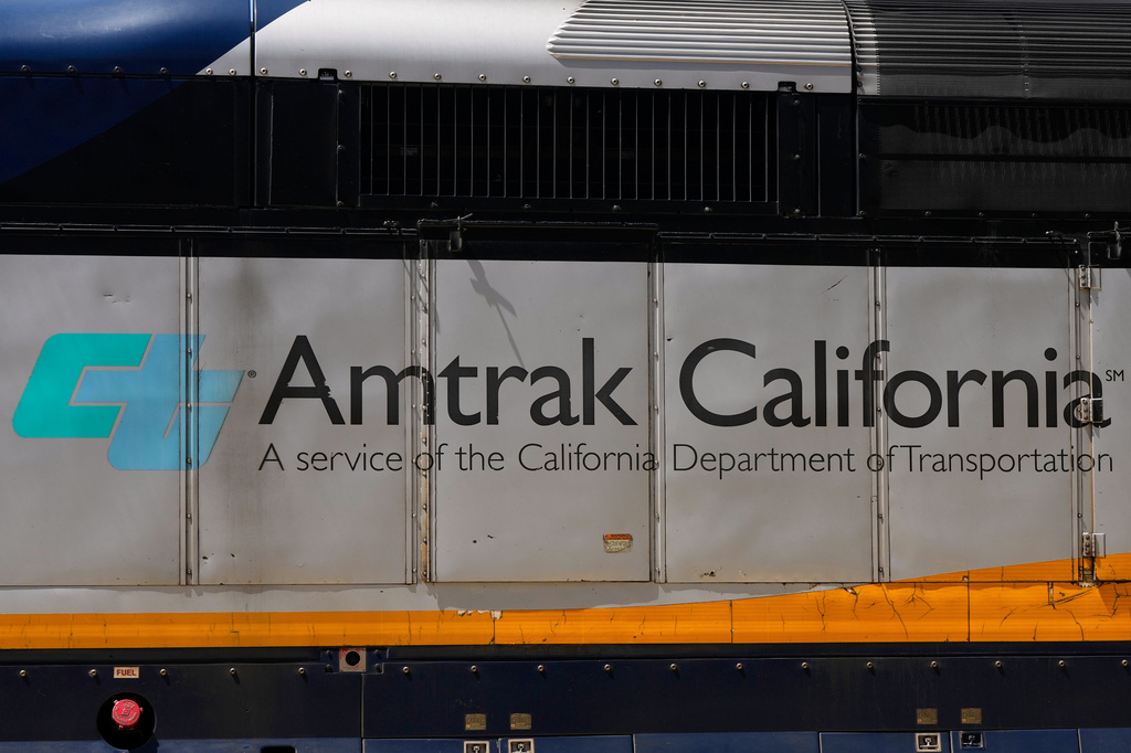 An Amtrak train leaves a station in Emeryville, Calif., Thursday, April 30, 2026. (AP Photo/Jeff Chiu)