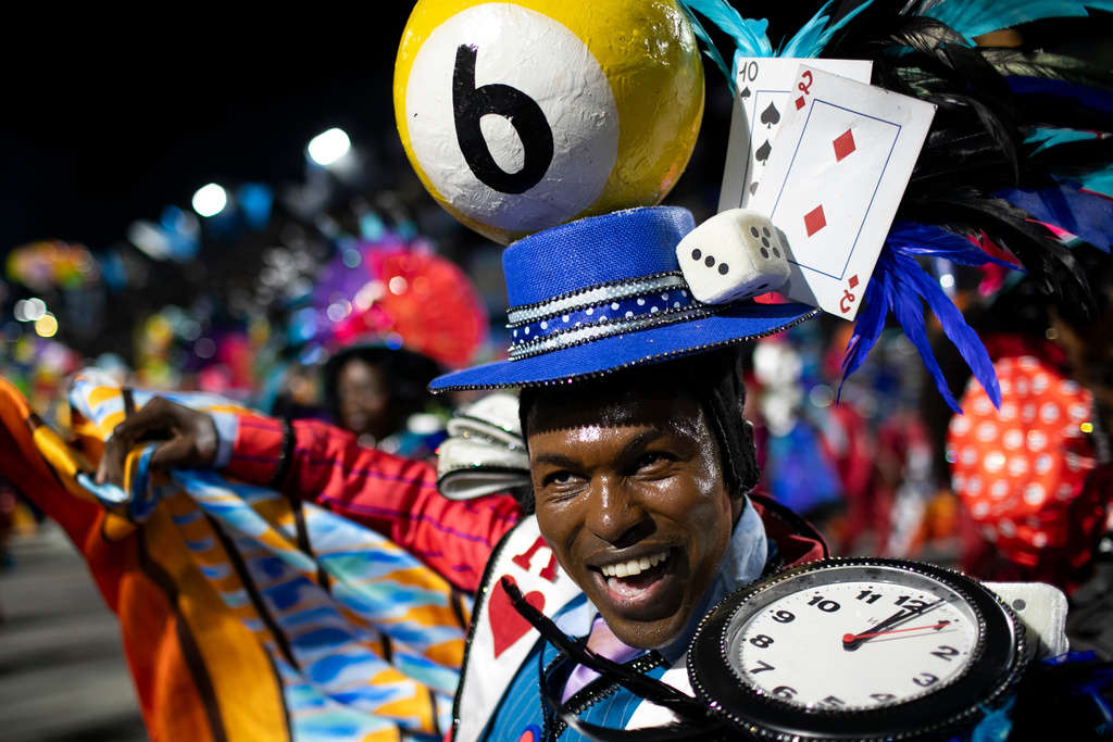 A performer from the Vila Isabel samba school parades during Carnival celebrations at the Sambadrome in Rio de Janeiro, early Wednesday, Feb. 18, 2026. (AP Photo/Bruna Prado)