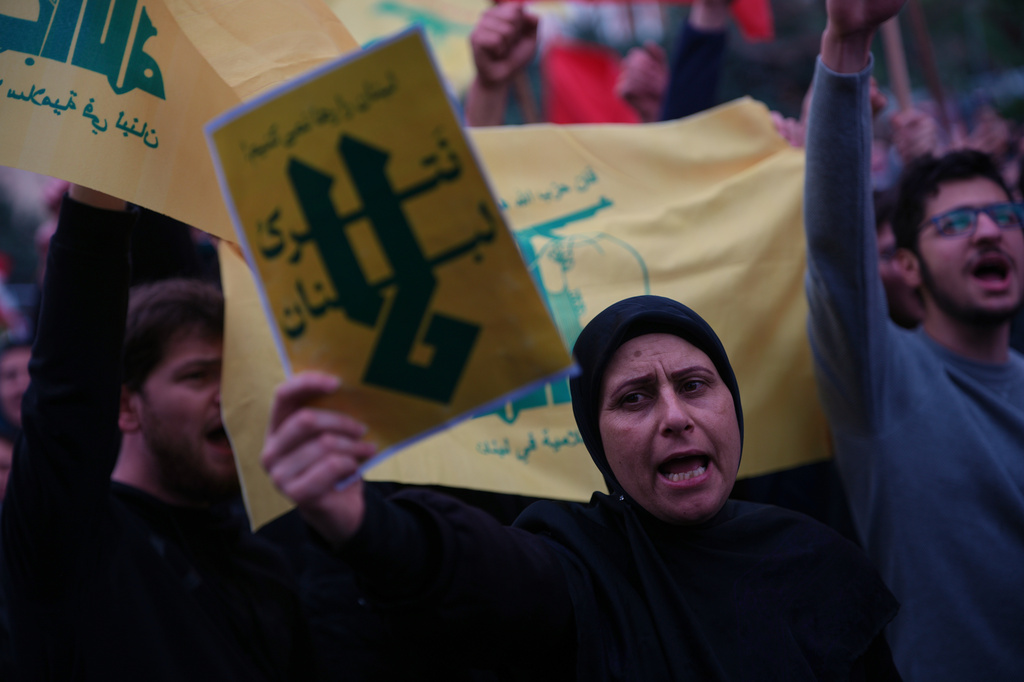 A Hezbollah supporter shouts slogans during a protest against the Lebanese Prime Minister Nawaf Salam, in front the government palace in Beirut, Lebanon, Friday, April 10, 2026. (AP Photo/Emilio Morenatti)
