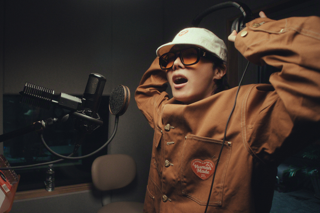 This image released by Netflix shows BTS member j-hope in a scene from the documentary "BTS: The Return." (Netflix via AP)