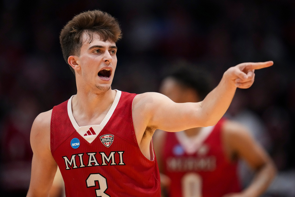 Miami (Ohio) guard Luke Skaljac reacts after scoring during the first half of a First Four college basketball game against SMU in the NCAA Tournament in Dayton, Ohio, Wednesday, March 18, 2026. (AP Photo/Jeff Dean)