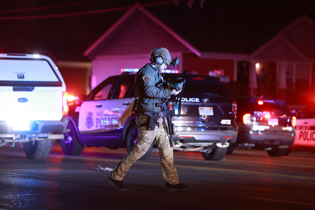 FILE - Police respond to a fatal shooting in a parking lot of The Church of Jesus Christ of Latter-day Saints in Salt Lake City on Wednesday, Jan. 7, 2026. (Rio Giancarlo/The Deseret News via AP,File)
