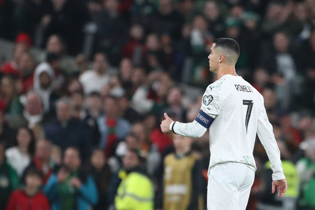 Portugal's Cristiano Ronaldo leaves the pitch after being shown a red card during a World Cup 2026 group F qualifying soccer match between Ireland and Portugal in Dublin, Thursday, Nov. 13, 2025. (AP Photo/Peter Morrison)