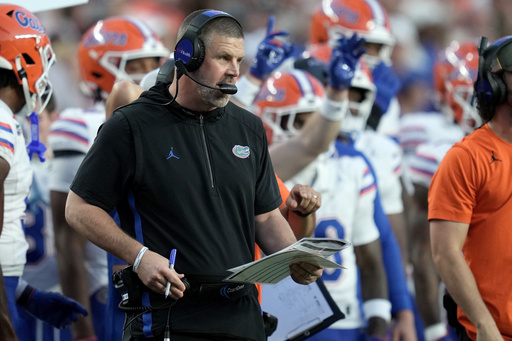 Florida head coach Billy Napier calls in plays to his offense during the first quarter of an NCAA college football game against Texas A&M on Saturday, Oct. 11, 2025, in College Station, Texas. (AP Photo/Sam Craft) Florida head coach Billy Napier calls in plays to his offense during the first quarter of an NCAA college football game against Texas A&M on Saturday, Oct. 11, 2025, in College Station, Texas. (AP Photo/Sam Craft)