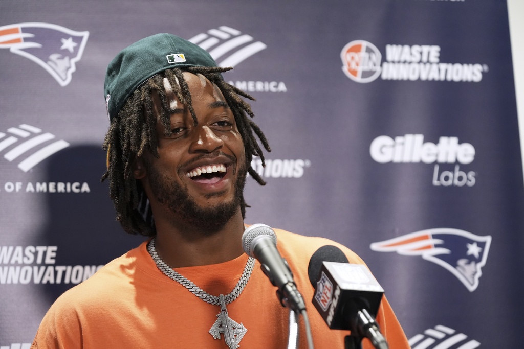 New England Patriots' Antonio Gibson talks after an NFL football game against the Miami Dolphins Sunday, Sept. 14, 2025, in Miami Gardens, Fla. (AP Photo/Lynne Sladky)