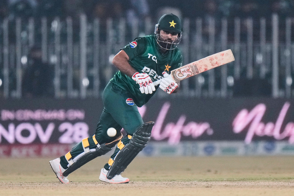 Pakistan's Fakhar Zaman plays a shot during the tri-series T20 cricket match between Pakistan and Zimbabwe, in Rawalpindi, Pakistan, Tuesday, Nov. 18, 2025. (AP Photo/Anjum Naveed)