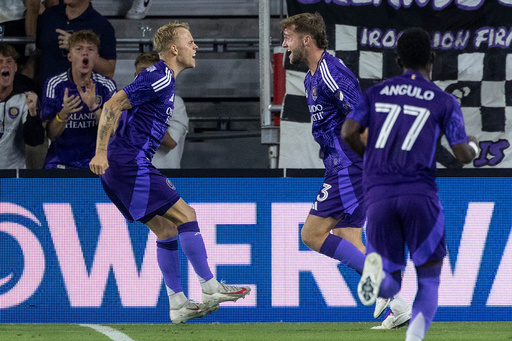 Orlando City midfielder Dagur Dan Thorhallsson, left, and forward Duncan McGuire react to Thorhallsson's goal against the Vancouver Whitecaps during the first half of an MLS soccer match, Saturday, Oct. 11, 2025, in Orlando, Fla. (AP Photo/Kevin Kolczynski) Orlando City midfielder Dagur Dan Thorhallsson, left, and forward Duncan McGuire react to Thorhallsson's goal against the Vancouver Whitecaps during the first half of an MLS soccer match, Saturday, Oct. 11, 2025, in Orlando, Fla. (AP Photo/Kevin Kolczynski)