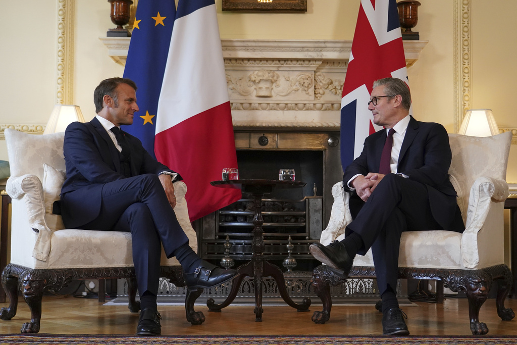 Britain's Prime Minister Keir Starmer and French President Emmanuel Macron sit down for bilateral talks at 10 Downing Street in London, Wednesday, July 9, 2025.(AP Photo/Alberto Pezzali, Pool)