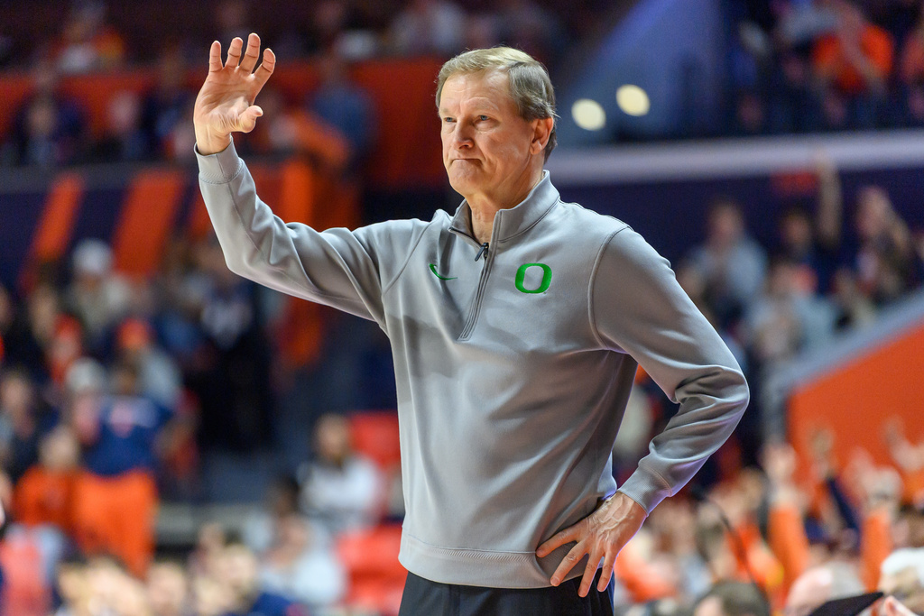 Oregon head coach Dana Altman motions to his team during an NCAA college basketball game against Illinois Tuesday, March 3, 2026, in Champaign, Ill. (AP Photo/Craig Pessman)