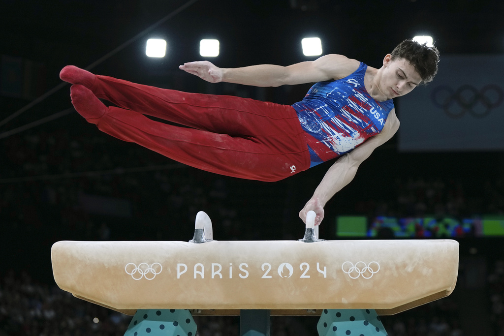 FILE - Stephen Nedoroscik, of United States, competes on the pommel horse during a men's artistic gymnastics qualification round at the 2024 Summer Olympics, July 27, 2024, in Paris, France. (AP Photo/Francisco Seco, File)