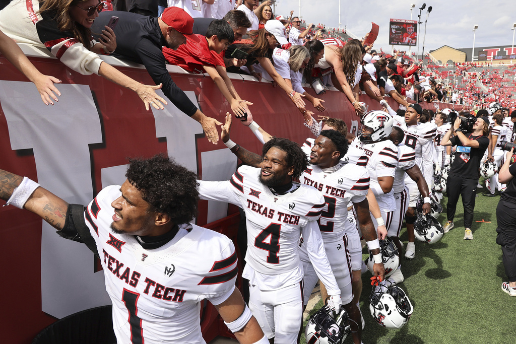 Texas Tech greet fans after their win over Utah in an NCAA college football game Saturday, Sept. 20, 2025, in Salt Lake City, Utah. (AP Photo/Jeffrey D. Allred)
