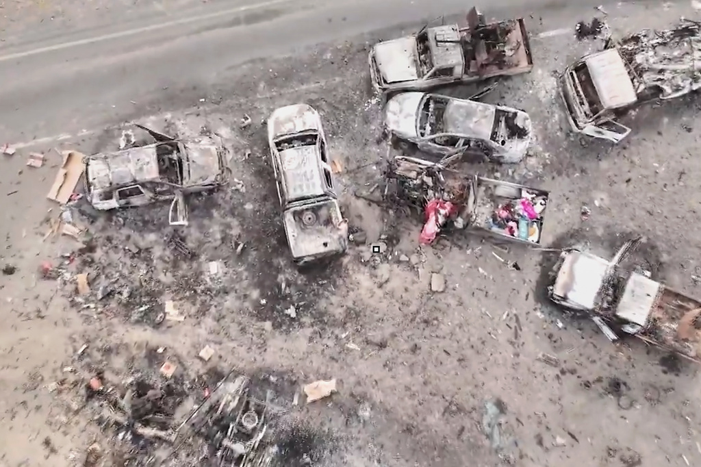 This image taken from undated video released by the Houthi-run Al-Masirah television channel on Saturday, Sept. 12, 2026, shows damaged vehicles on a road between the Dhubab and Amri junctions in Yemen, according to the channel. (Al-Masirah TV via AP)
