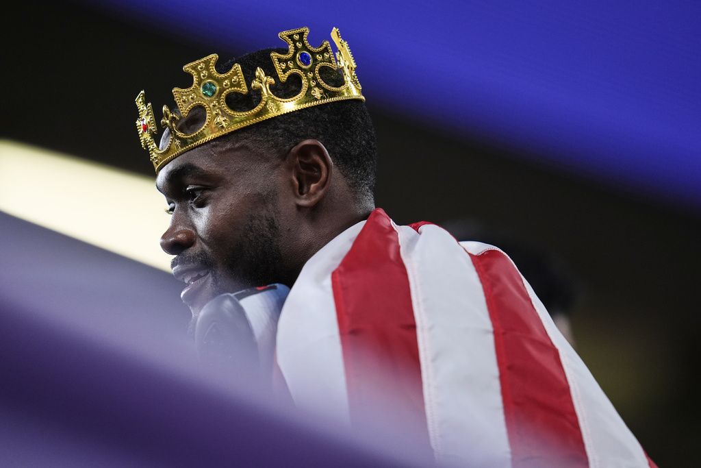 United States' Rai Benjamin, gold medalist in the men's 400 meters hurdles, celebrates at the World Athletics Championships in Tokyo, Friday, Sept. 19, 2025. (AP Photo/Abbie Parr)