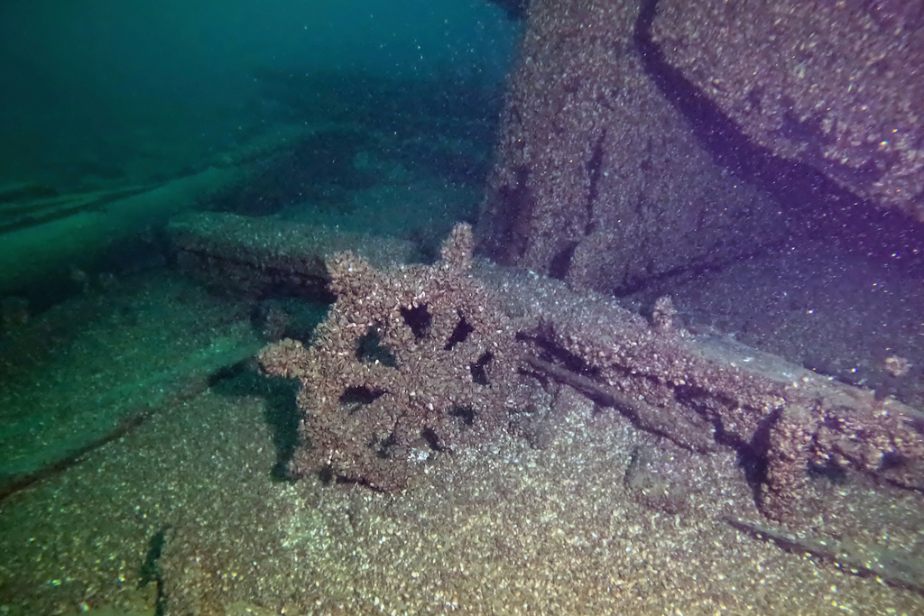 In this photo released by the Wisconsin Historical Society, the wheel of the F.J. King shipwreck is seen in Lake Michigan on Aug. 23, 2025. (Wisconsin Historical Society via AP)