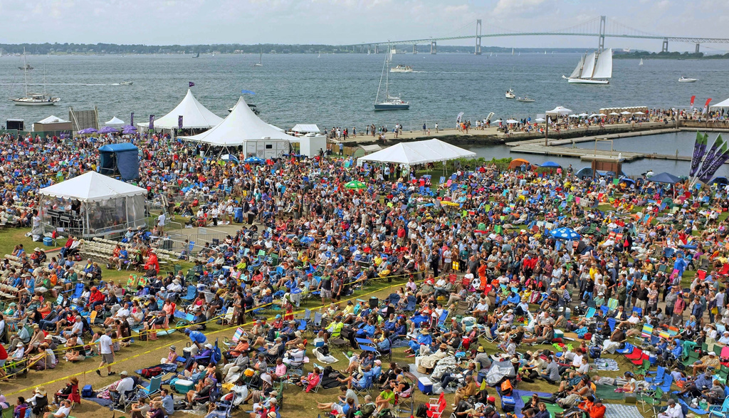 FILE - Music fans fill the grounds of Fort Adams State Park on Narragansett Bay for the Newport Jazz Festival in Newport, R.I., on Aug. 2, 2013. (AP Photo/Joe Giblin, File)