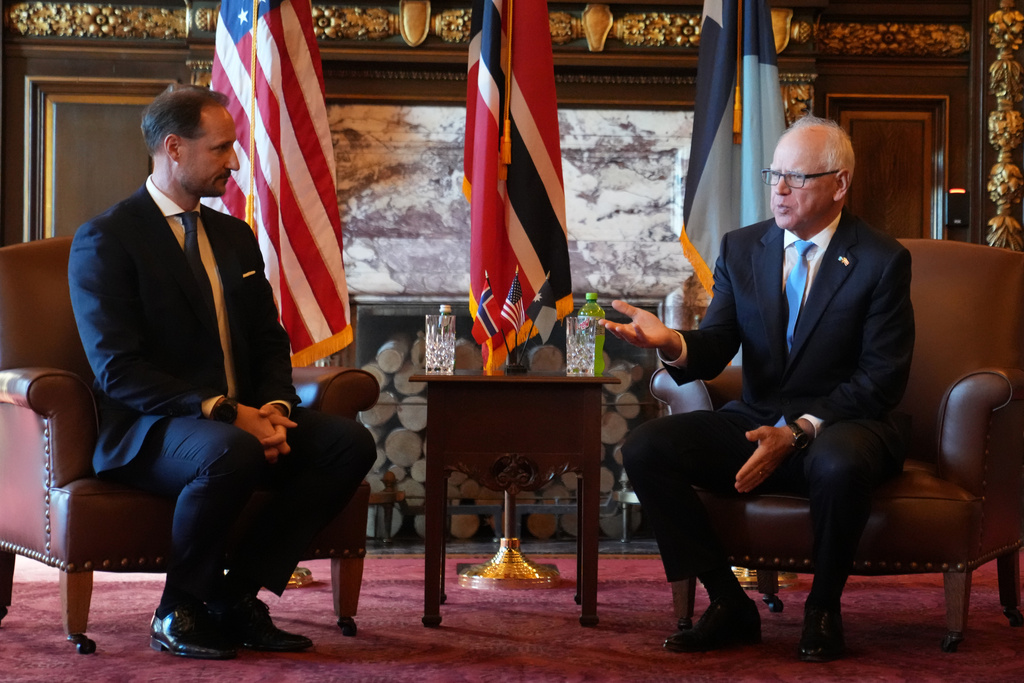 Minnesota Governor Tim Walz, right, meets with Crown Prince Haakon of Norway to arrive a the Capitol in St Paul on Tuesday, Oct. 7, 2025. (AP Photo/Abbie Parr)