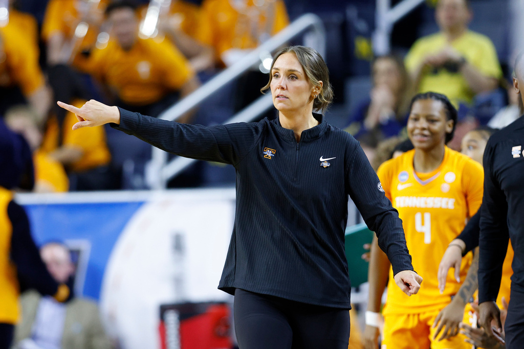 Tennessee coach Kim Caldwell gives instructions against North Carolina State during the first half in the first round of the NCAA college basketball tournament, Friday, March 20, 2026, in Ann Arbor, Mich. (AP Photo/Al Goldis)