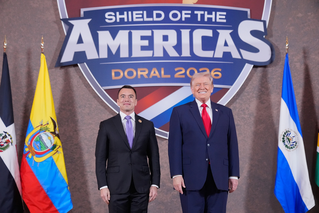 President Donald Trump greets President of Ecuador Daniel Noboa at the Shield of the Americas Summit, Saturday, March 7, 2026, at Trump National Doral Miami in Doral, Fla. (AP Photo/Mark Schiefelbein)