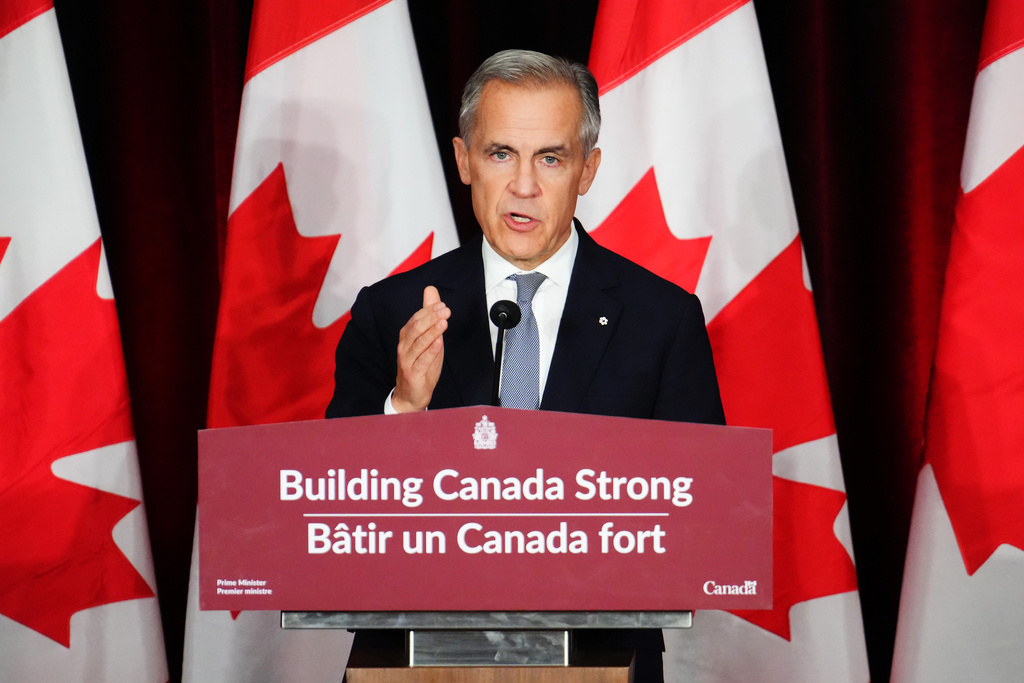 Canada Prime Minister Mark Carney makes a live address on Canada's plan to build a stronger economy in advance of the 2025 Budget, at the University of Ottawa in Ottawa on Wednesday, Oct. 22, 2025. (Sean Kilpatrick/The Canadian Press via AP)