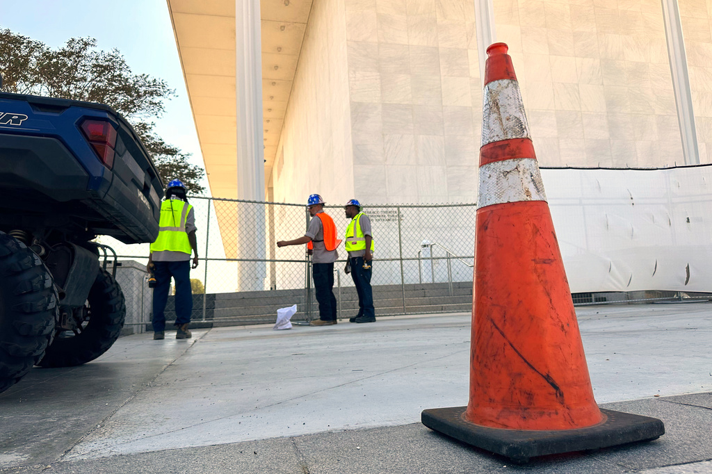 Fencing is placed outside the John F. Kennedy Center for the Performing Arts on Wednesday, Sept. 16, 2026, in Washington. (AP Photo/Nathan Ellgren)