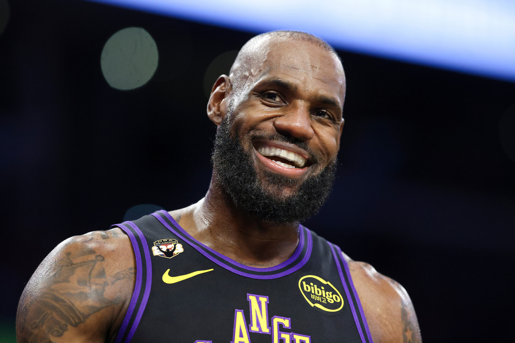 FILE - Los Angeles Lakers forward LeBron James reacts during the first half of an NBA basketball game against the Phoenix Suns, Friday, April 10, 2026, in Los Angeles. (AP Photo/Jessie Alcheh, File)